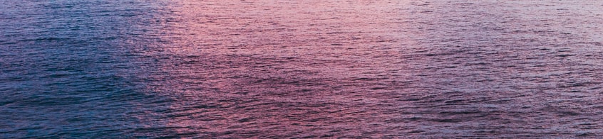 blue and purple reflections on water